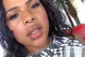 Ebony shemale with fake boobs is playing with her cock and fucks her own ass with a toy