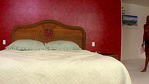 Ebony with huge tits rides white dick in bed