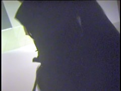Girl leans forward and shakes tits into