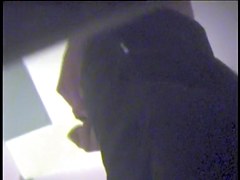 Girl leans forward and shakes tits into