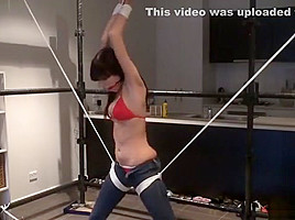 Girls tied topless in jeans - standing spread eagle