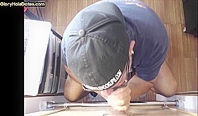 Gloryhole gay enjoys sucking nice dick while stroking it