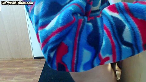 Gloryhole inked BJ DILF sucks BFs cock through hole at home