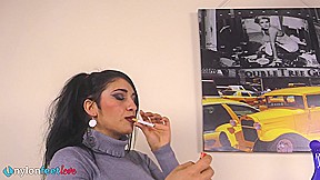 Gorgeous Sharon smoking a cigarette and showing off her nyloned feet