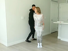 Gym Girl Mummified In Saran Wrap