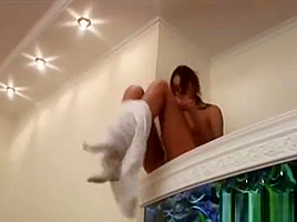 Hairy brunette masturbating for a music