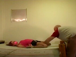 Helpless tied on bed