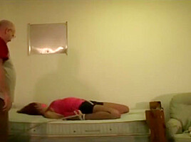 Helpless tied on bed