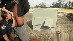 Horny milf cops takes computer thiefs cock in a rooftops