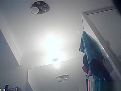 Hot blonde undresses and showers