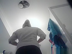 Hot blonde undresses and showers