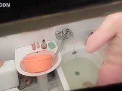 Hot woman washes in the bathtub