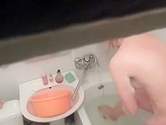 Hot woman washes in the bathtub
