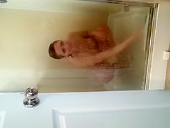 Husband films wife in shower