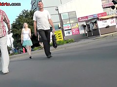 Long-legged girls gets upskirted on the bus stop