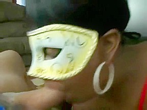 Masked ebony chick sucks giving head