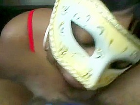 Masked ebony chick sucks giving head
