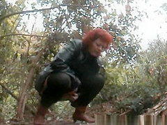 Mature redhead pee in the forest