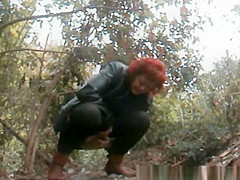 Mature redhead pee in the forest