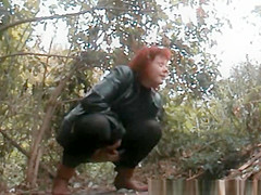 Mature redhead pee in the forest
