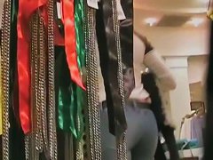 Milf in tight jeans in the clothing shop becomes the street candid