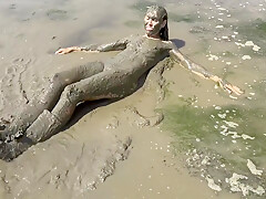 Muddy Girl Playing In The Nude