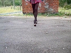 Nylon tights, high heel and school skirt
