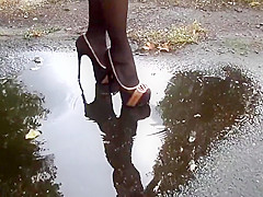 Nylon tights, high heel and school skirt