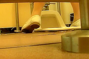 Office girls are pissing in the womens WC