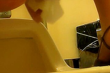 Office girls are pissing in the womens WC