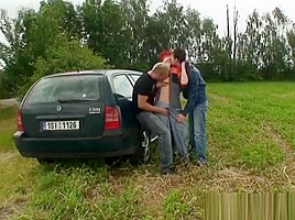 Old whore is double fucked outdoors