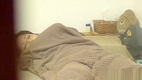Oriental slut masturbates