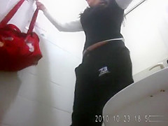 Pregnant amateur and others piss in public toilet