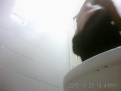 Pregnant amateur and others piss in public toilet