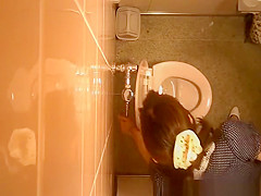 Public toilet ceiling catches women pissing