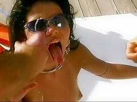 Ravishing brunette has two guys drilling her holes at once on a boat