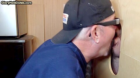 Senior gloryhole amateur DILF blows BFs dick through hole
