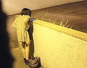 Sexy Tatted Escort in a Skirt