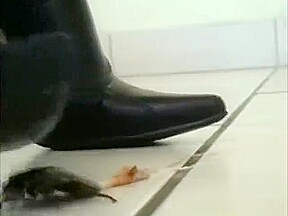 Sexy little asian in high heel leather boots crushing roaches