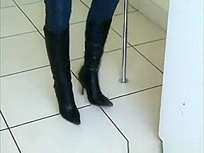 Sexy little asian in high heel leather boots crushing roaches