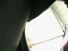 Sexy upskirt view with cute babe in pink skirt