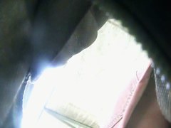Sexy upskirt view with cute babe in pink skirt