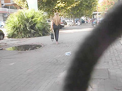 Spy beautiful blonde's ass in tight jeans and wedges