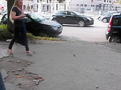 Spy beautiful blonde's ass in tight jeans and wedges