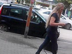 Spy beautiful blonde's ass in tight jeans and wedges