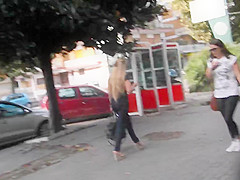Spy beautiful blonde's ass in tight jeans and wedges