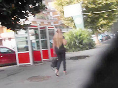 Spy beautiful blonde's ass in tight jeans and wedges
