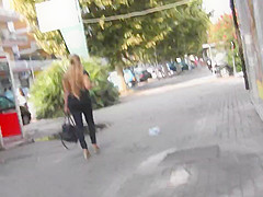 Spy beautiful blonde's ass in tight jeans and wedges