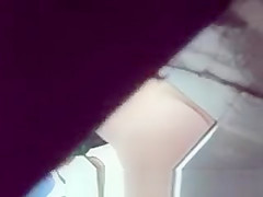 Spying blonde in toilet