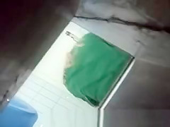 Spying blonde in toilet